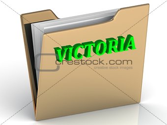 VICTORIA- bright letters on a gold folder on 