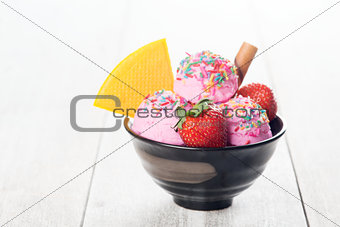 Pink ice cream in bowl 