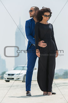 Couple on the background of skyscrapers