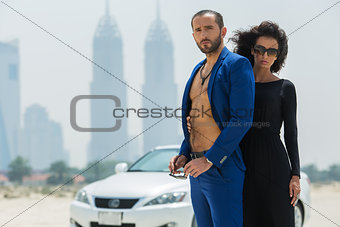 Couple on the background of skyscrapers