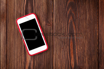 Smartphone on wooden table