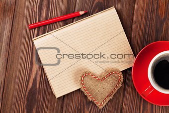 Valentines day toy heart, coffee cup and notepad