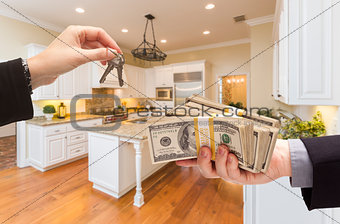 Handing Over Cash for Keys Inside Beautiful Kitchen