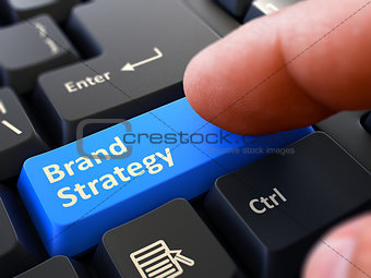 Brand Strategy Concept. Person Click Keyboard Button.