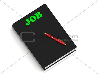 JOB- inscription of green letters on black book 