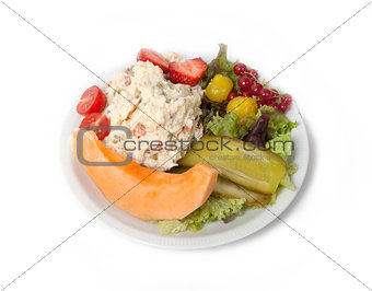 Snack time - View of Russian salad on a white plate