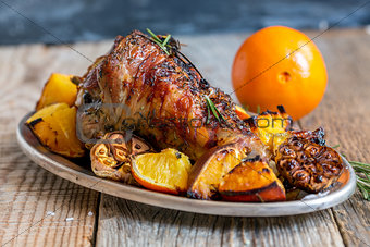 Thigh of turkey baked with rosemary and orange.