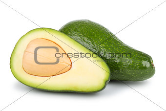 Whole and half avocado
