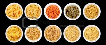 Set of different types of pasta on the black background