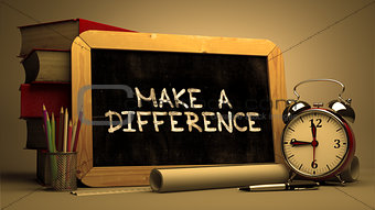 Make a Difference - Chalkboard with Hand Drawn Text.