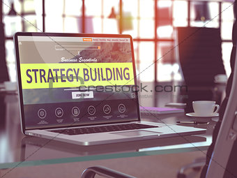Strategy Building on Laptop in Modern Workplace Background.