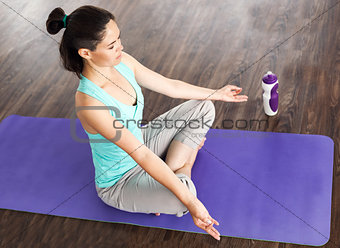 girl meditation in the lotus position. Yoga studio