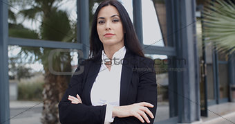 Confident serious young businesswoman
