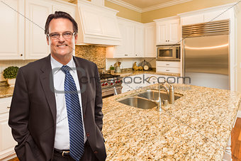Man Wearing Necktie in Beautiful Custom Residential Kitchen