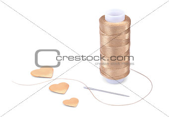 Thread, needle and hearts