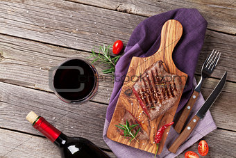 Grilled beef steak with rosemary, salt and pepper and wine