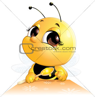 bee sits with a spoon