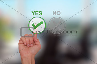Hand Choose yes on virtual screen. Business technology concept