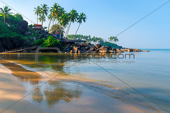 fine sand on a tropical beach and sea waves