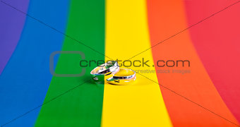 two rings on the background of rainbow flag