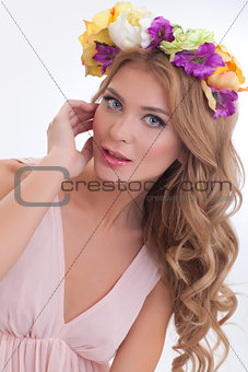 Spring girl with flower wreath
