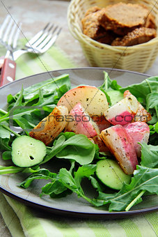 fresh healthy salad with radish, cucumber and arugula