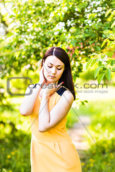 Portrait of young asian woman in spring blossom trees