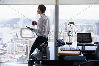 Business Man Reading News Press Review On Tablet PC