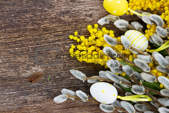French mimosa and catkins with easter eggs