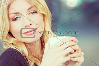 Instagram Style Photo of Blond Woman Drinking Coffee