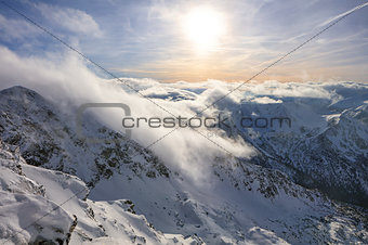Winter landscape of high snowy mountains