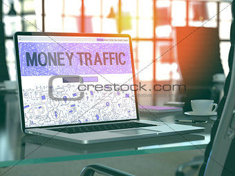 Money Traffic on Laptop in Modern Workplace Background.