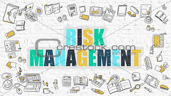 Risk Management on White Brick Wall.