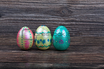 Traditional Easter eggs on wooden backgorund
