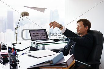 Daydreaming Successful Man Office Worker Throwing Paper Airplane
