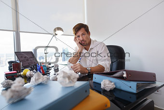 Portrait Sad Business Man Trying To Write Paper Letter