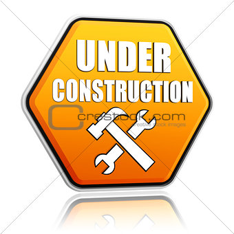 under construction and tools sign yellow hexagon banner