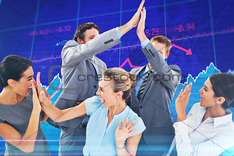 Composite image of excited business team cheering