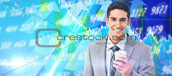 Composite image of businessman using mobile phone with colleagues behind