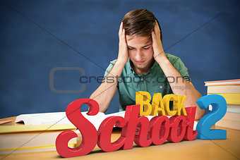 Composite image of student sitting in library reading