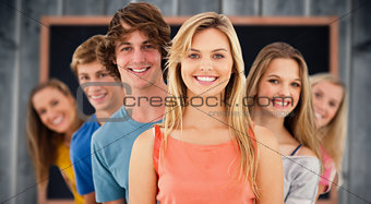 Composite image of group standing behind one another at varied angles