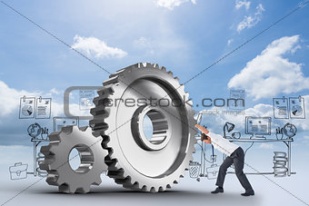 Composite image of businessman bending and pushing