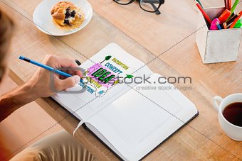 Composite image of man writing notes on diary