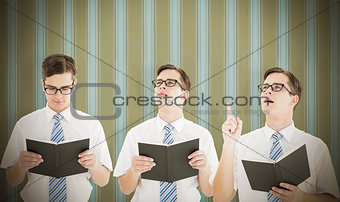 Composite image of nerd reading book