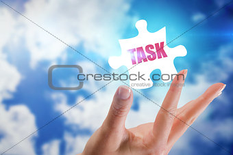 Task against bright blue sky with clouds