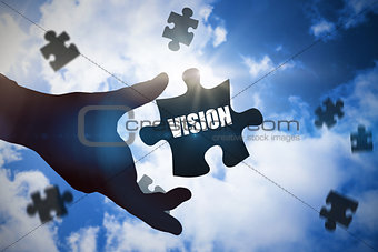 Vision  against bright blue sky with clouds