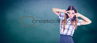 Composite image of geeky hipster dancing