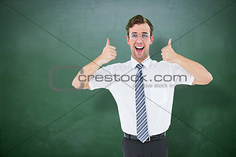 Composite image of happy geeky businessman with thumbs up