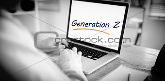 Generation z against businessman working on his laptop