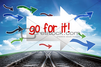 Go for it! against railway leading to blue sky